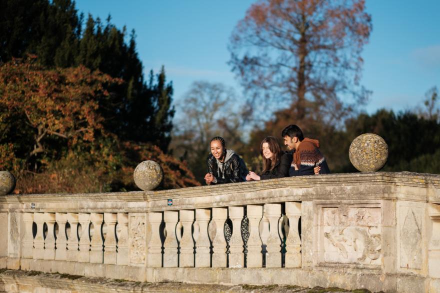 Students on the Bridge in Autumn