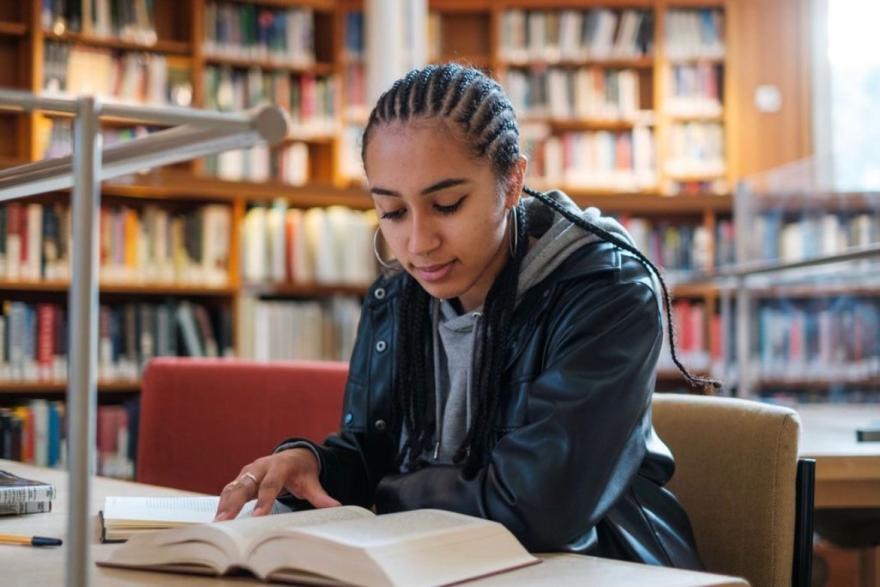 Clare student in the library