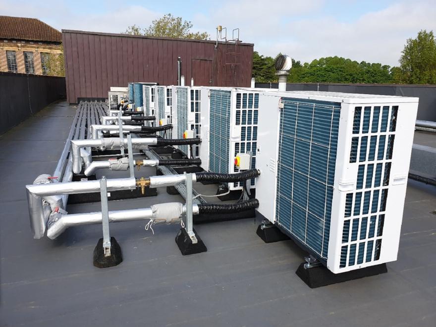 Bank of Air Source Heat Pumps on Lerner Court Roof